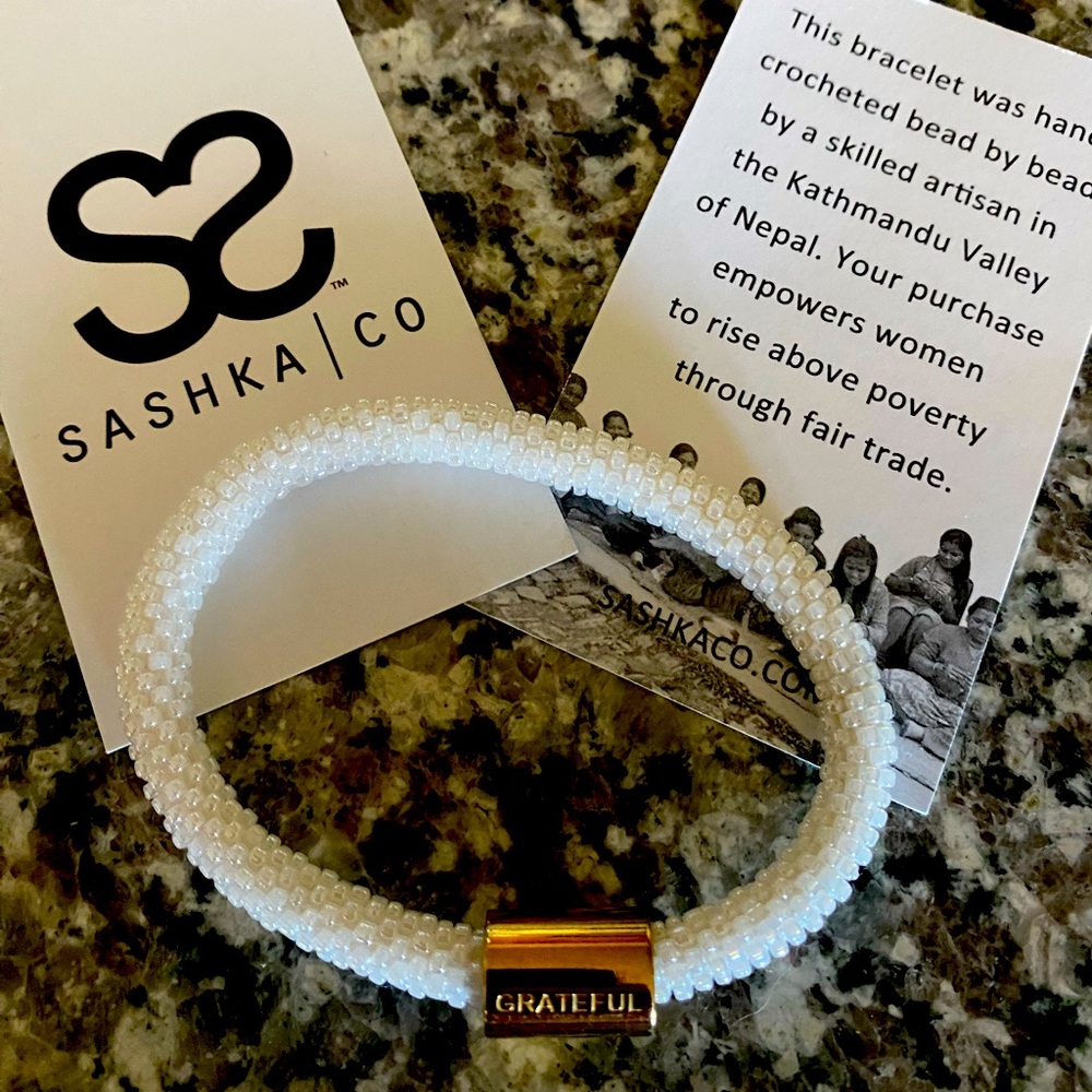 SASHKA Bracelet White Solid Glass Beaded with gold GRATEFUL bead.